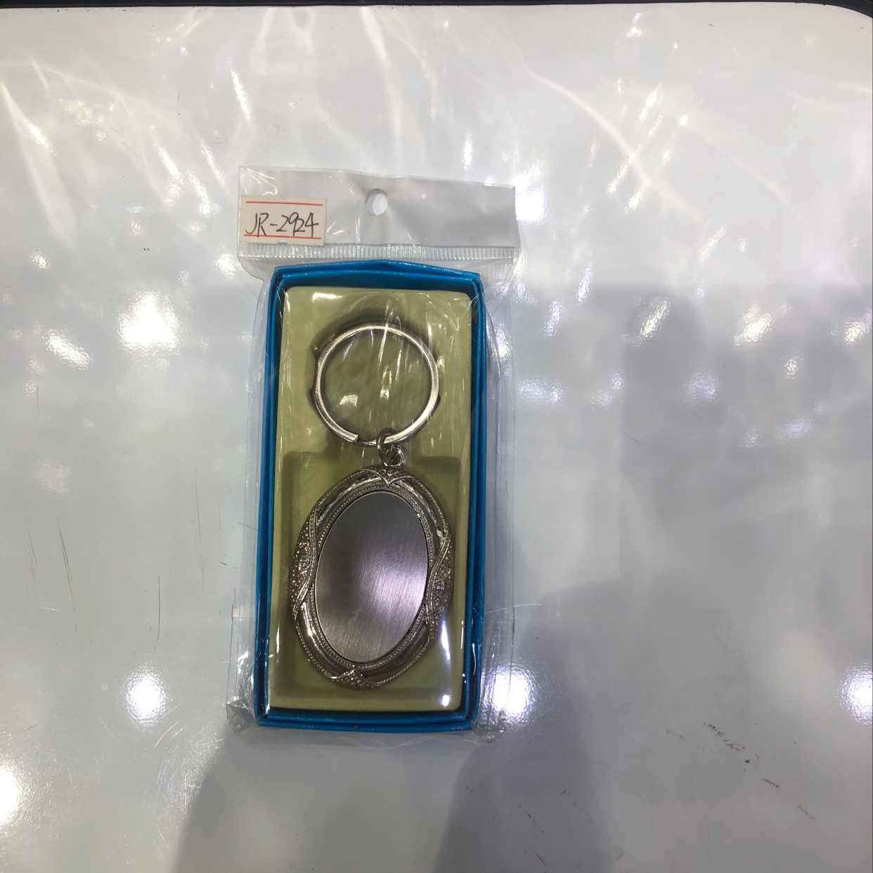 Oval-shaped lace keychain