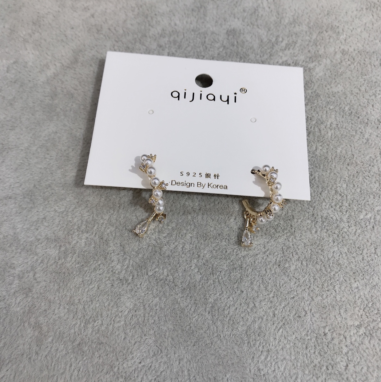 Pearl and stone sling with half curved ear thumbnail