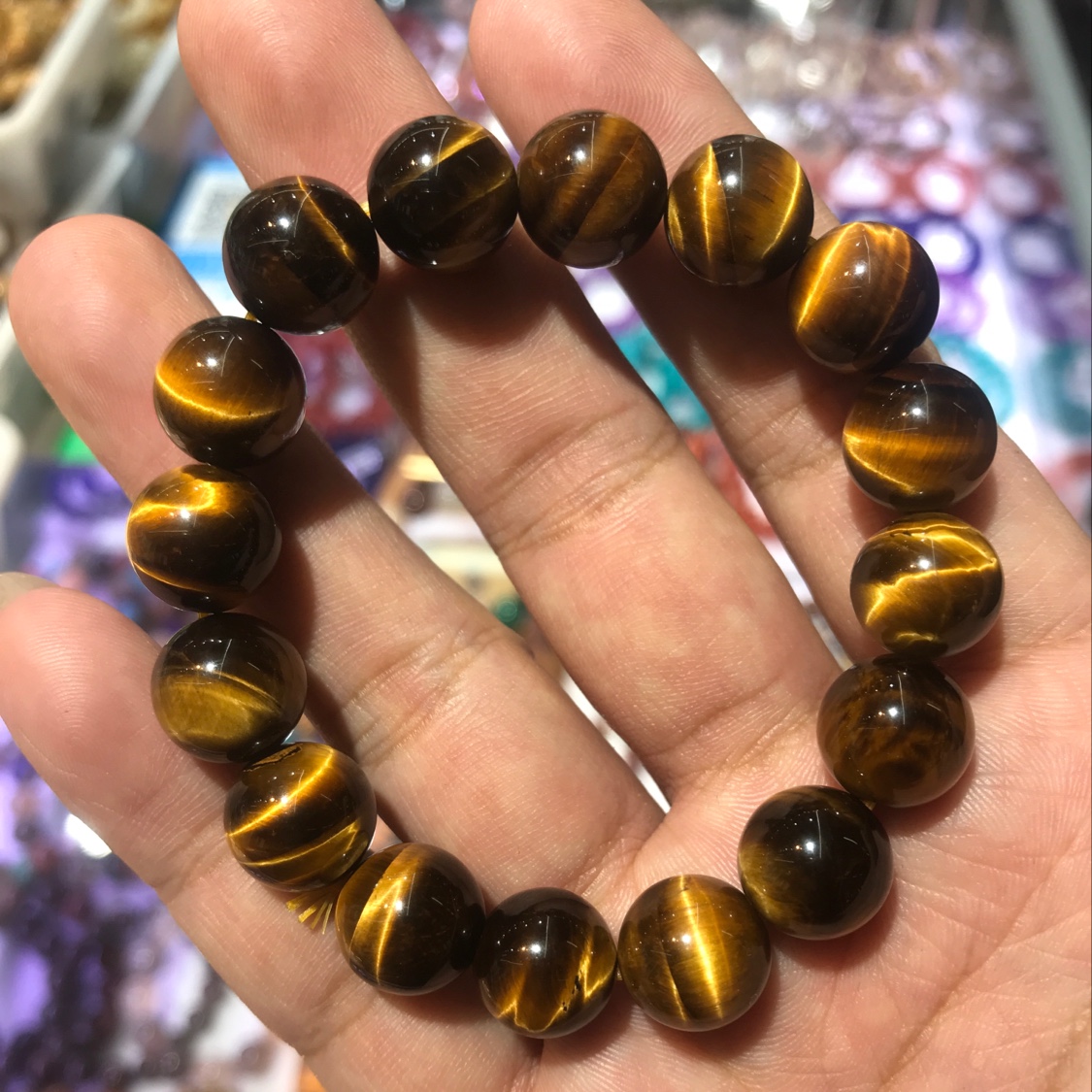 Tiger's Eye, grade 5A, 10mm in diameter