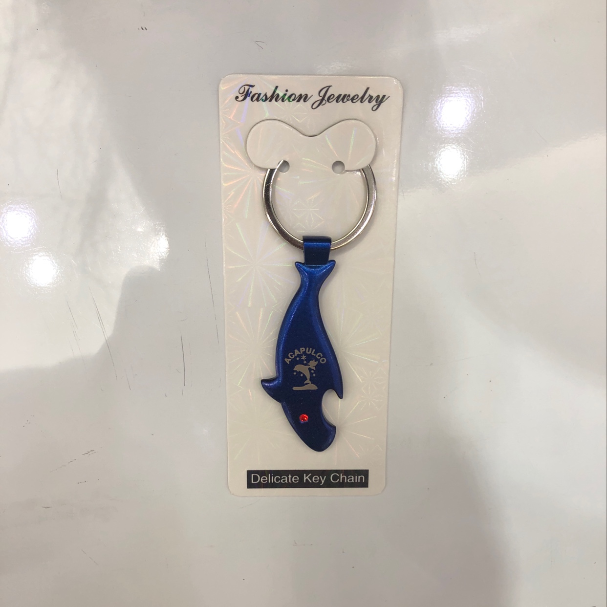 Spray-painted blue shark keychain details Picture