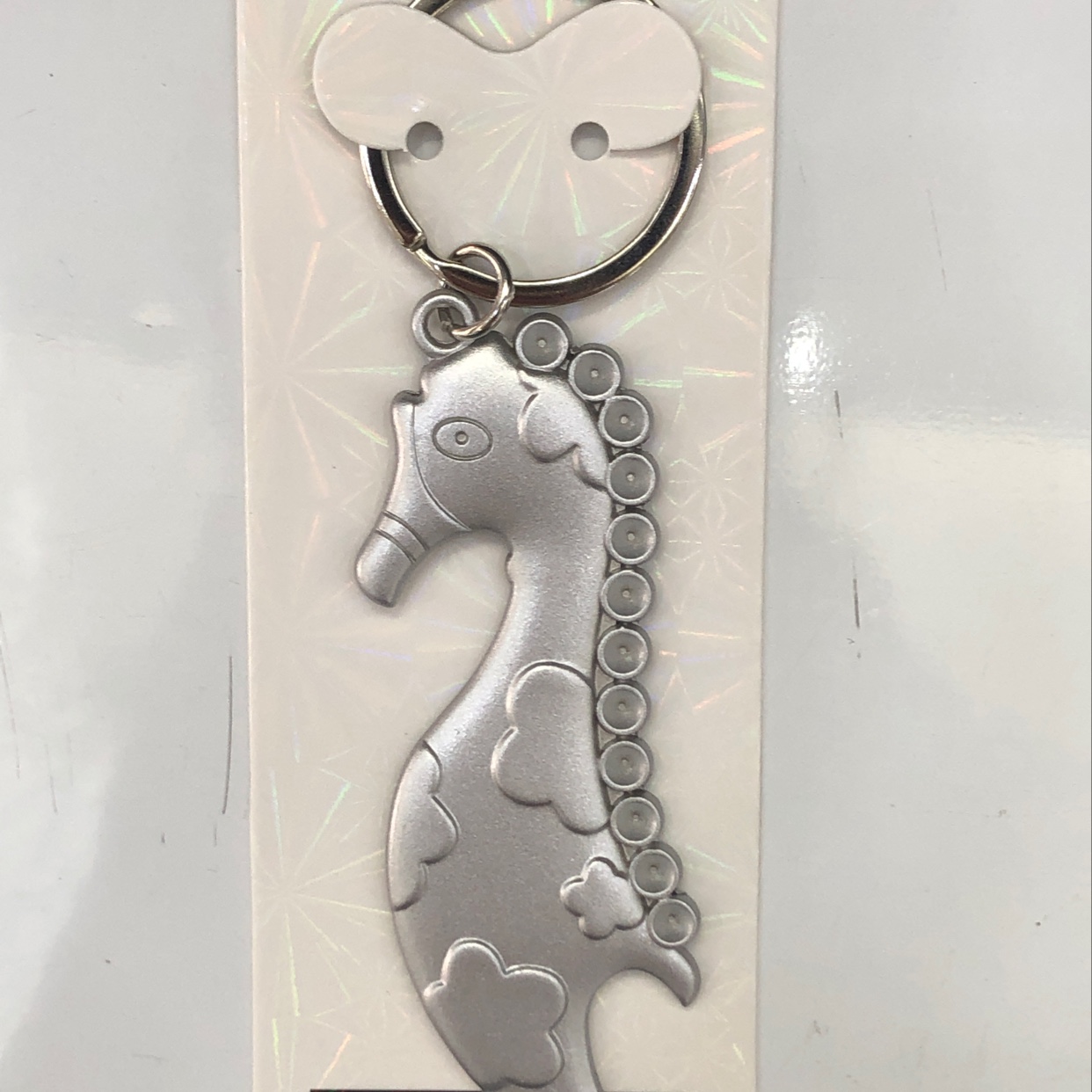 Spray-painted silver small seahorse keychain details Picture