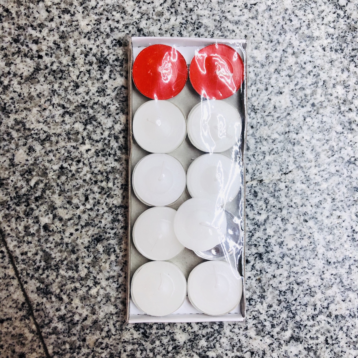 Ten white cartons