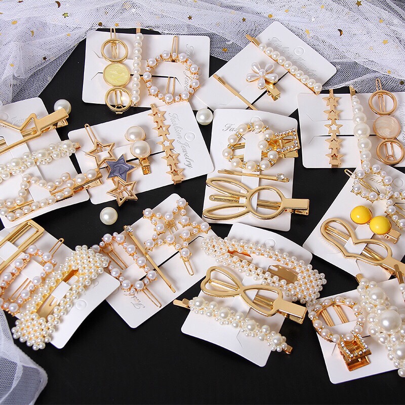 Three-piece set of popular pearl hair clips from Dongdaemun, South Korea. Sweet hair clips for women from the factory
