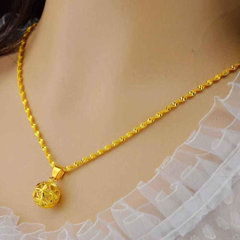 A new gold-plated necklace for women with a faux sand gold color gold pendant and collarbone chain