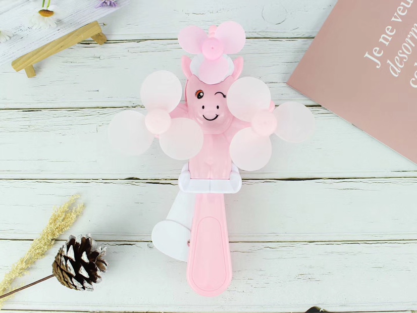 The three-head unicorn hand-pressed mini fan is selling well at the street stall undefined