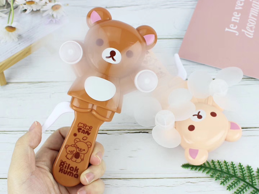 The hot-selling small-sized bear baby double-head hand-pressed fan and handheld mini fan are selling well at the street stall undefined