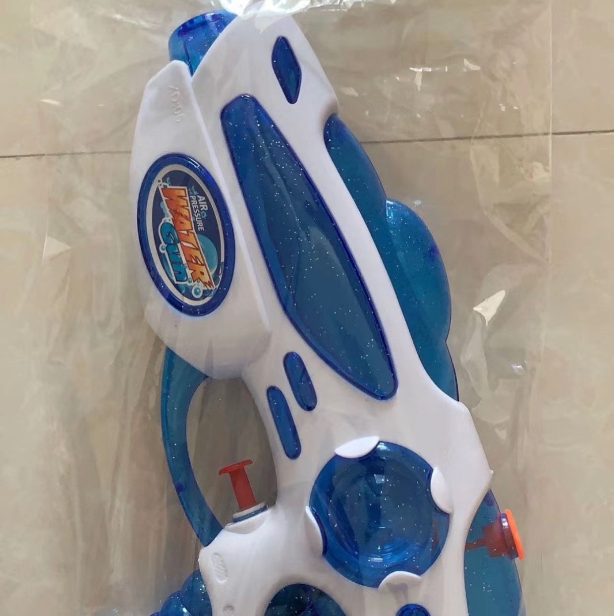 White and blue water gun thumbnail