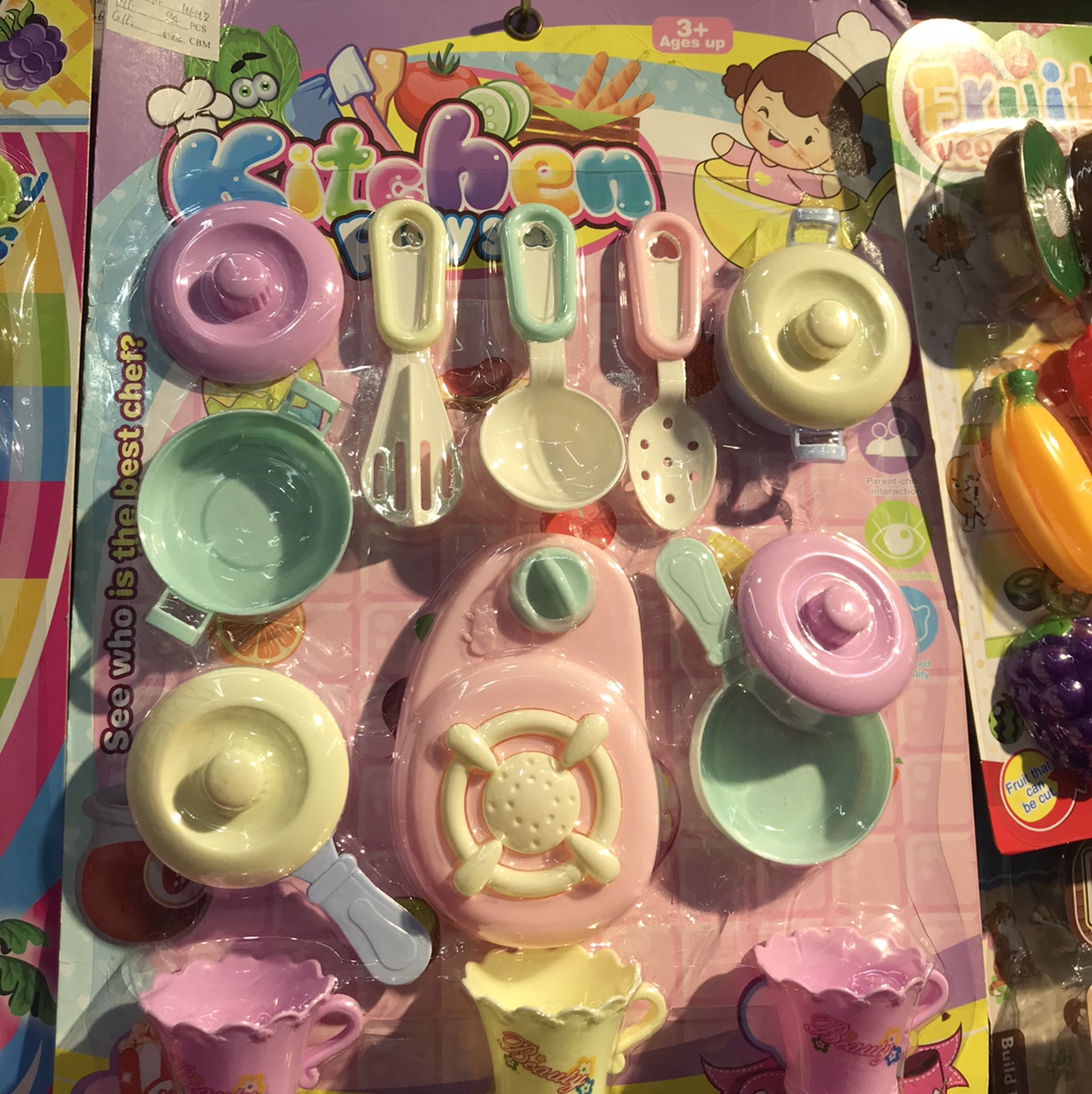 Children play with cooking toys thumbnail