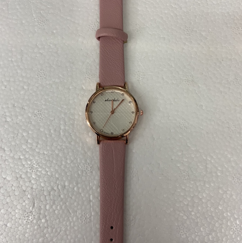 Trendy and fashionable leather strap watch for caring ladies