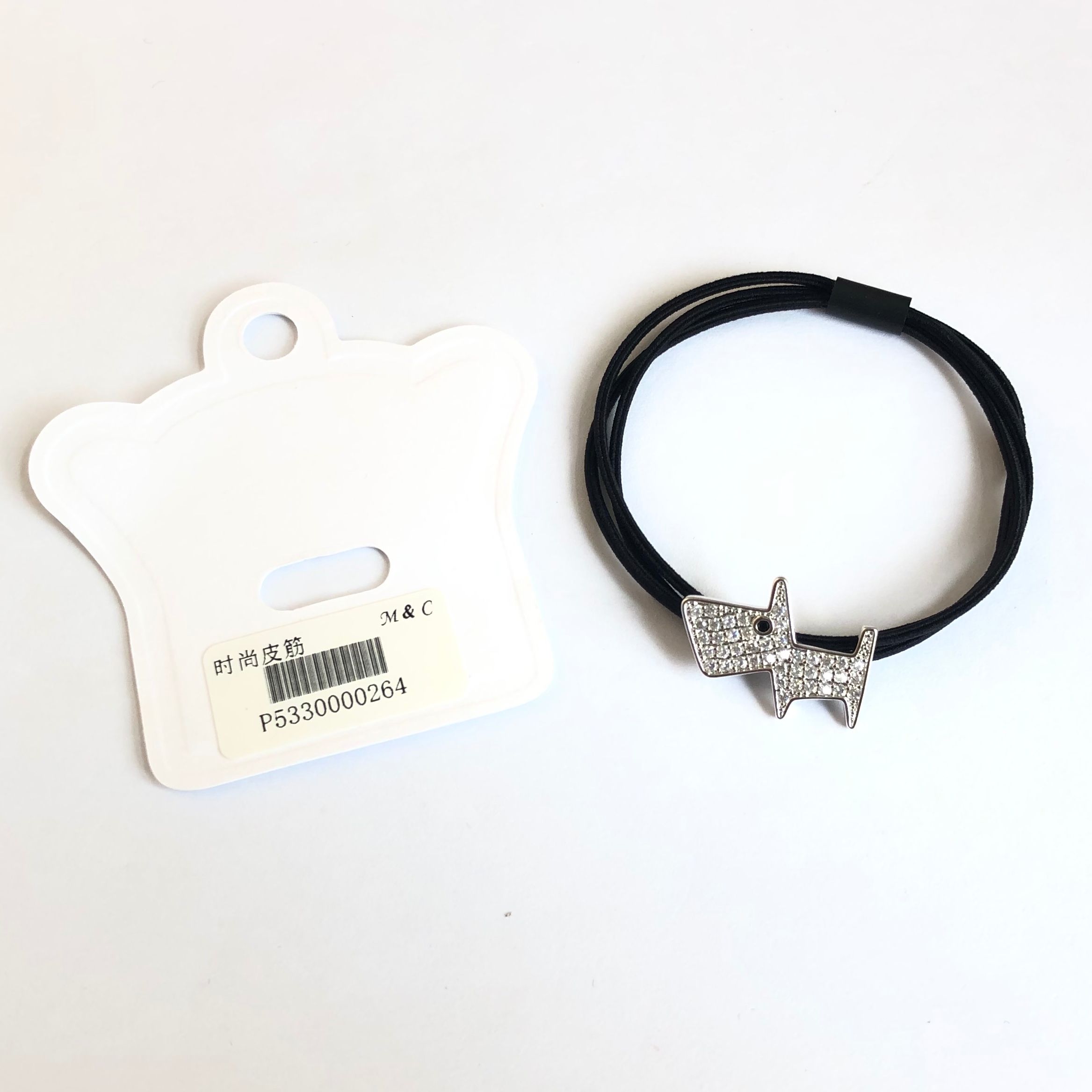 Korean-style diamond-encrusted puppy with three nylon black rubber bands