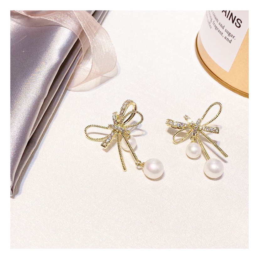 2020 new fashion micro bow earrings female personality atmosphere retro imitation pearl pendant 925 silver needle earrings 2550 bar code price 80 thumbnail