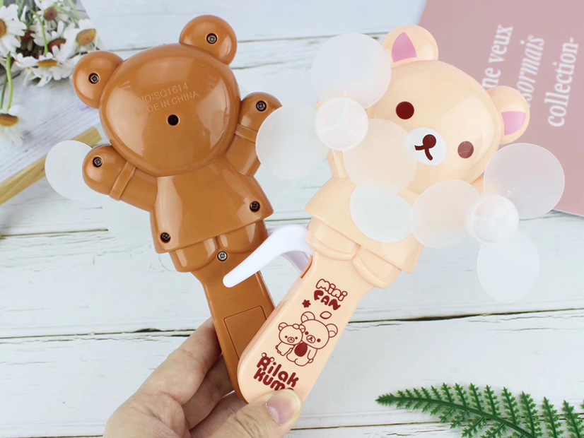 The hot-selling small-sized bear baby double-head hand-pressed fan and handheld mini fan are selling well at the street stall undefined