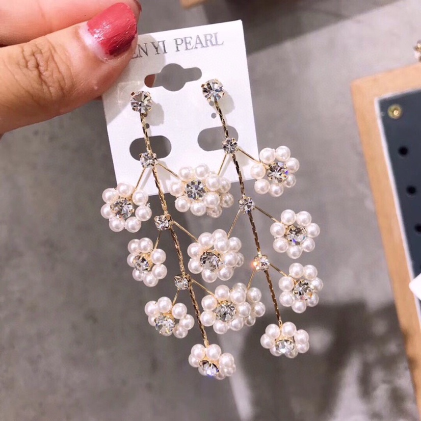 Japan's new tree branch artificial pearl flower earrings super fairy temperament only beautiful silver needle earrings web celebrity exaggerated earrings 1783 bar code price 100