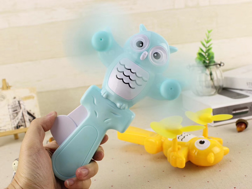 Hot-selling owl double-head mini hand pressure fans, hand-held hand pressure fans, and children's double-head hand pressure fans are selling well at street stalls undefined