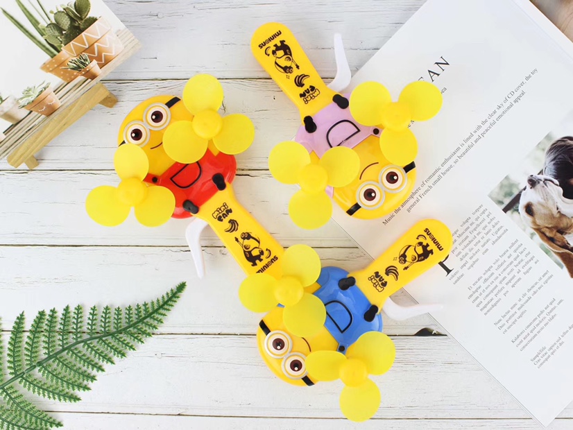 The small double-headed minions hand pressure fans and handheld mini fans are selling well at street stalls Item Picture