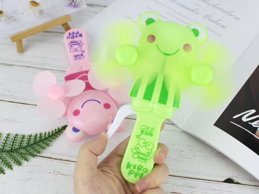 Hot-selling small frog double-head hand-pressed mini fans and handheld mini fans are selling well at street stalls undefined