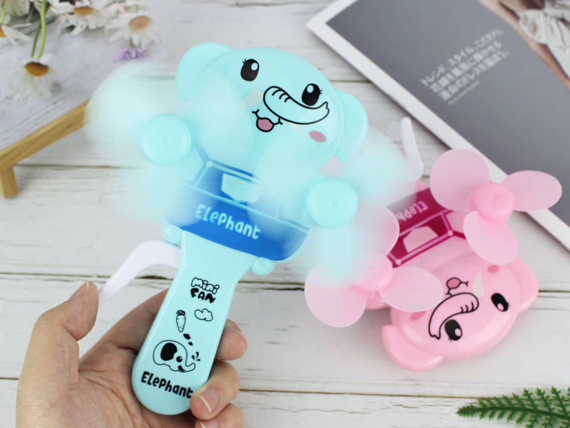 The hot-selling Little Elephant small double-head hand pressure fan and the handheld mini hand pressure small fan are selling well at the street stall Application Scenario