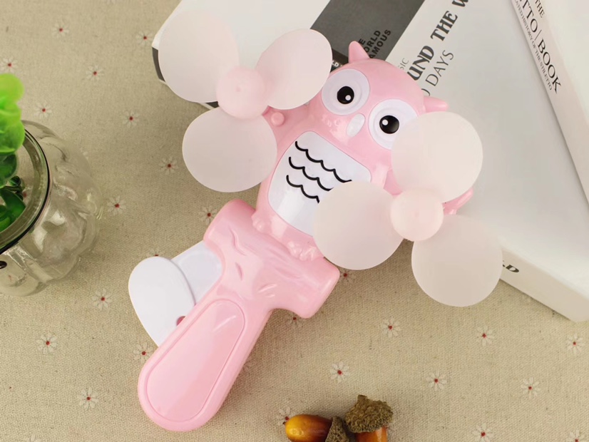 Hot-selling owl double-head mini hand pressure fans, hand-held hand pressure fans, and children's double-head hand pressure fans are selling well at street stalls undefined