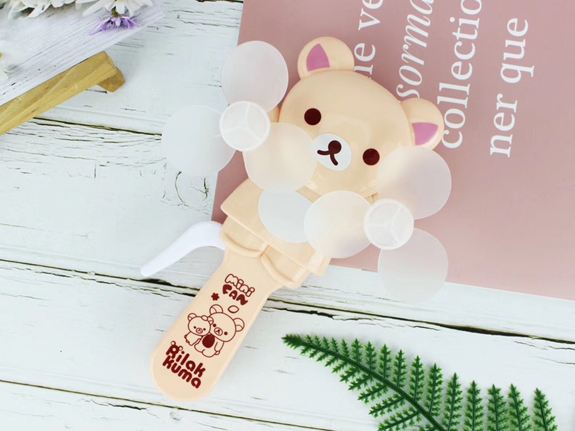 The hot-selling small-sized bear baby double-head hand-pressed fan and handheld mini fan are selling well at the street stall undefined