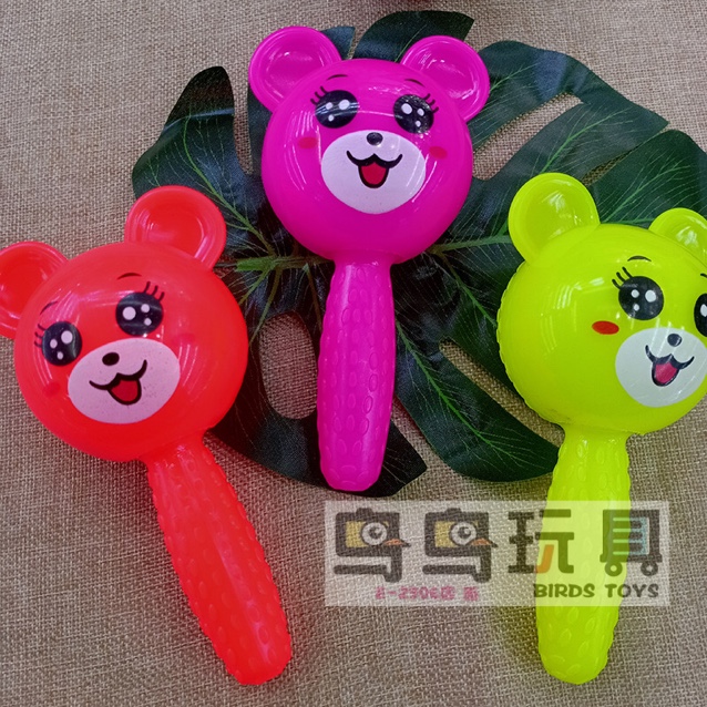 A flashing toy with a whistle is called a ball handle bear thumbnail