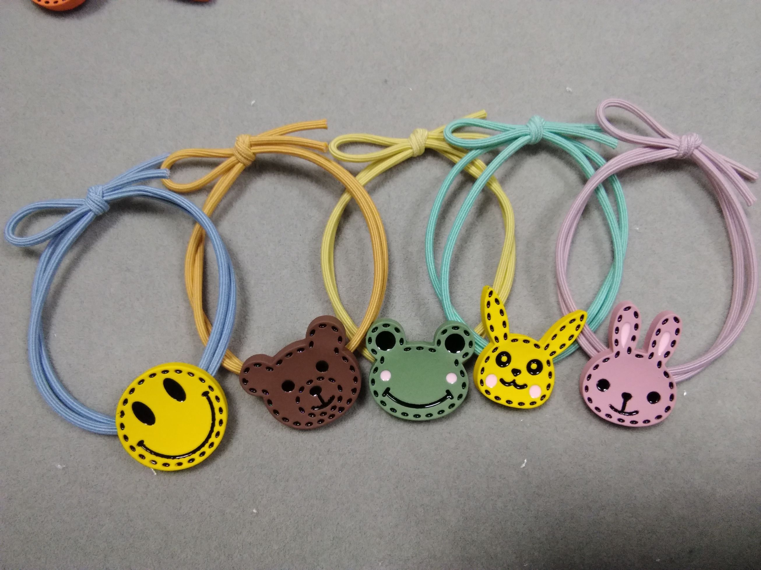 Alloy smiling animal head double-layer circular knot rubber band