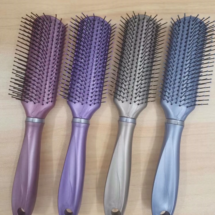 A variety of different massage combs and curling wooden combs details Picture
