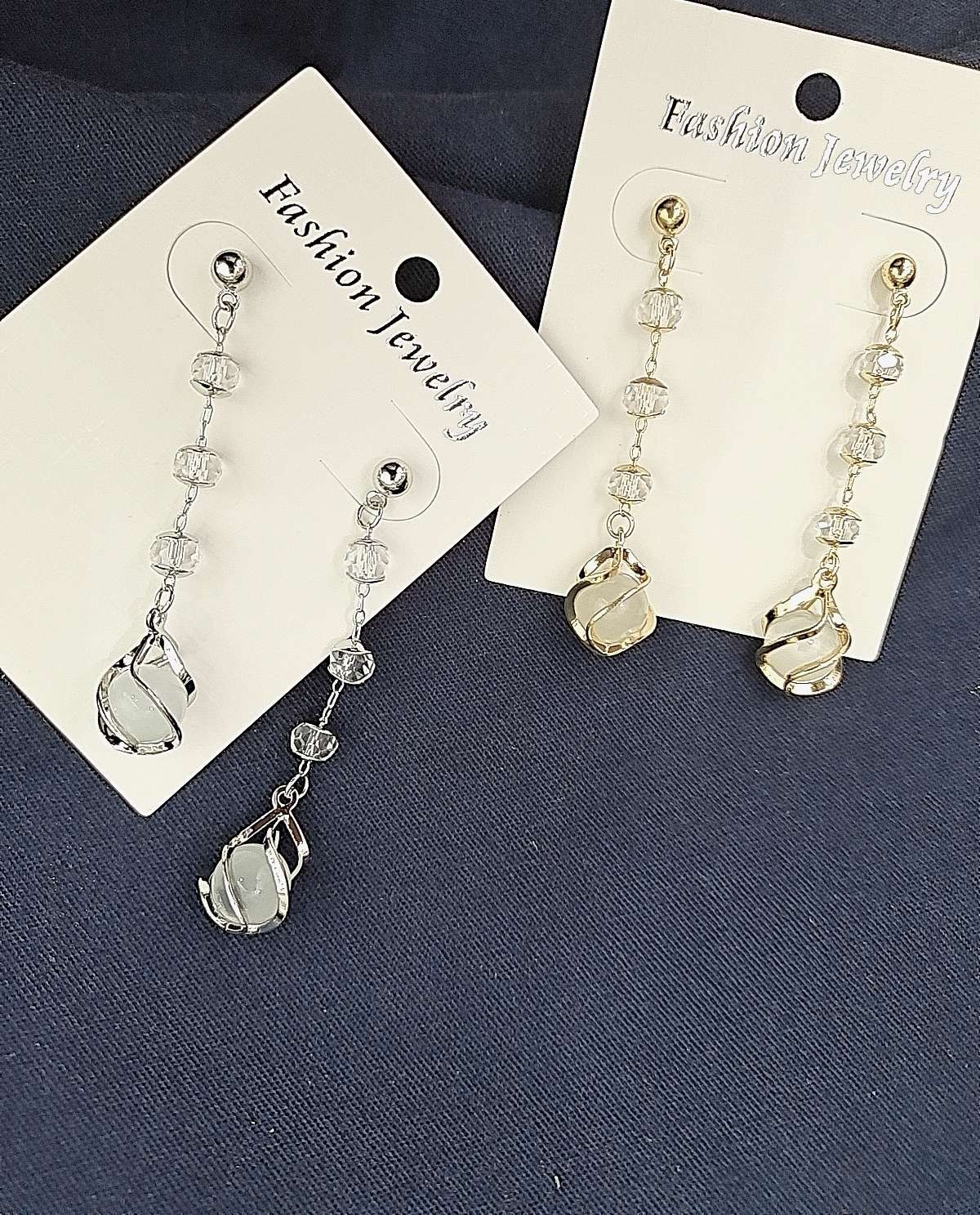Cat's eye earrings female long temperament South Korean net red crystal earrings exquisite simple long thin face all matching ear Sueyebrow