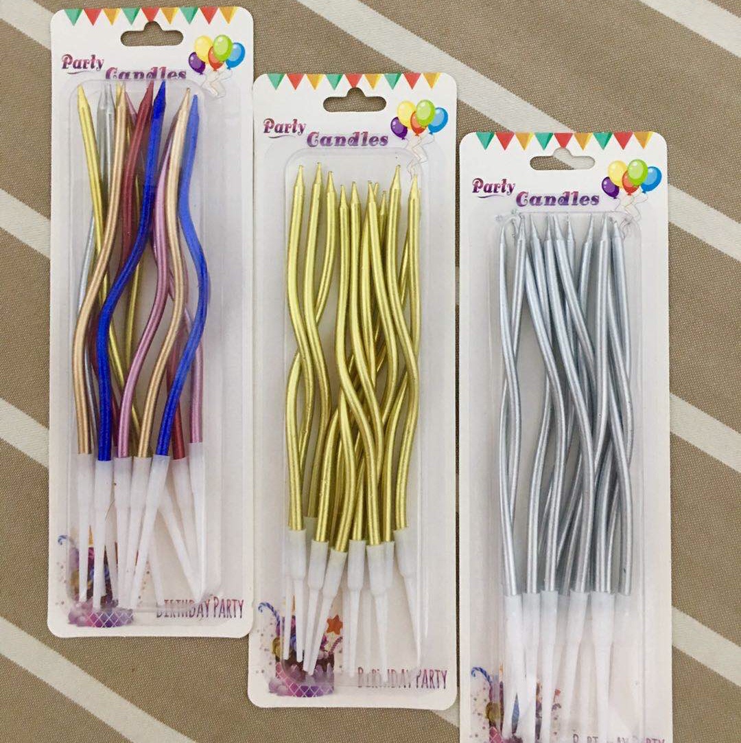 Bent gold and silver candle thumbnail