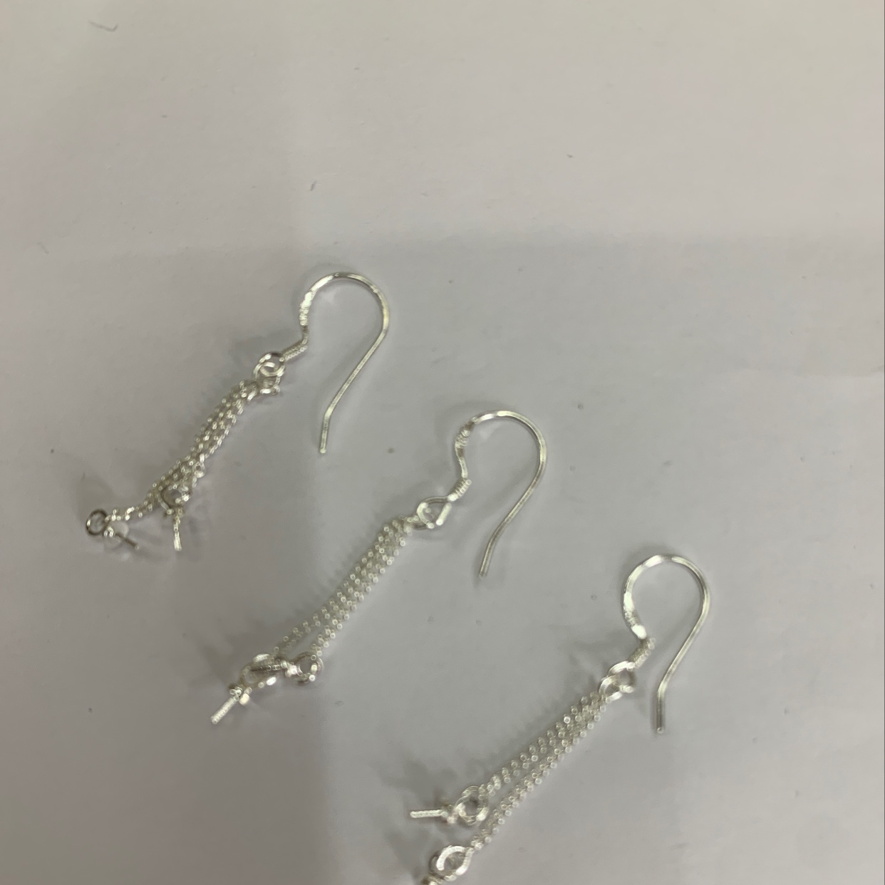Ear thread hook
