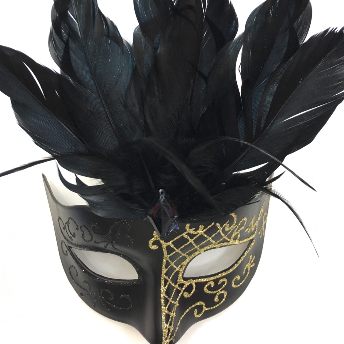 Manufacturers sell feather masks for masquerade parties thumbnail