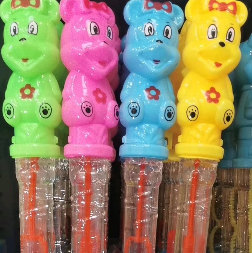 The 38CM cartoon-shaped bubble sticks with five holes and seven colors are selling well at the street stall undefined