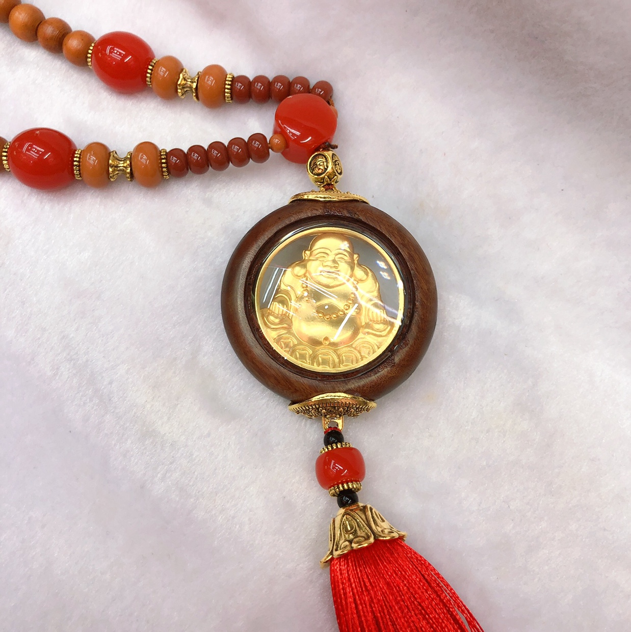 Beaded rosewood alloy Smiling Buddha pendant.