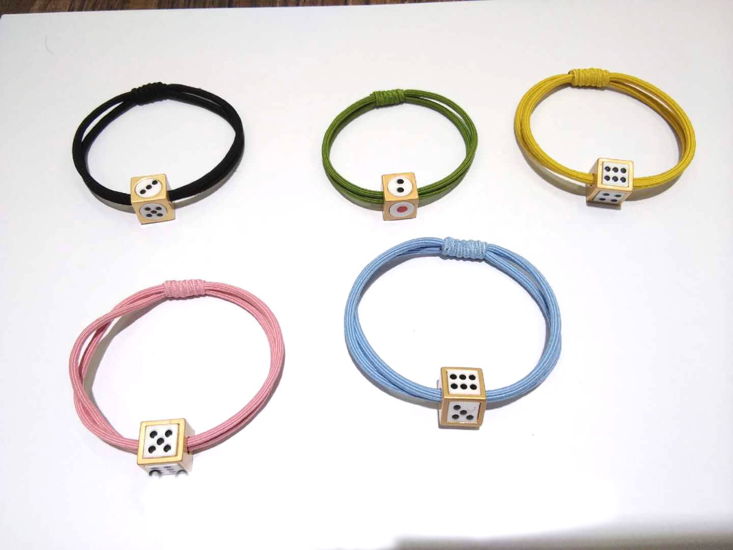 Alloy dice wound double-layer rubber band
