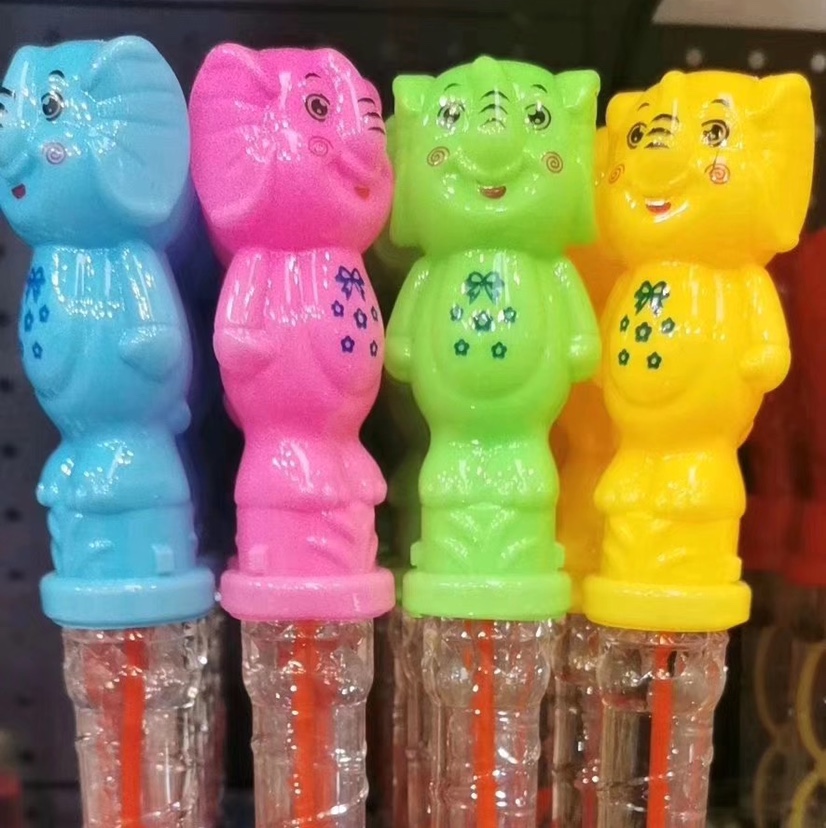 The 38CM cartoon-shaped bubble sticks with five holes and seven colors are selling well at the street stall undefined