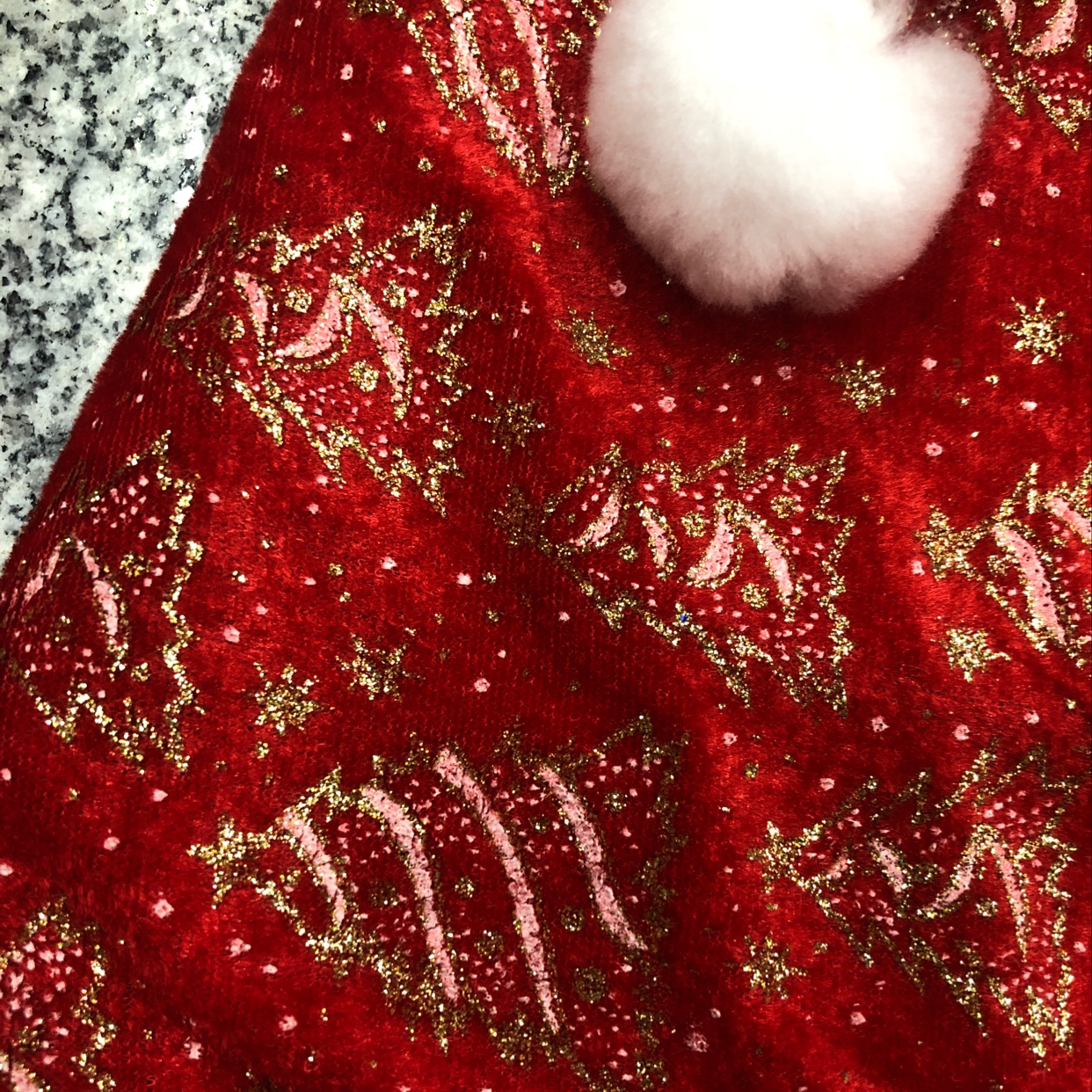 A woolen velvet Christmas hat with gold powder and fringed Christmas tree pattern Specification image