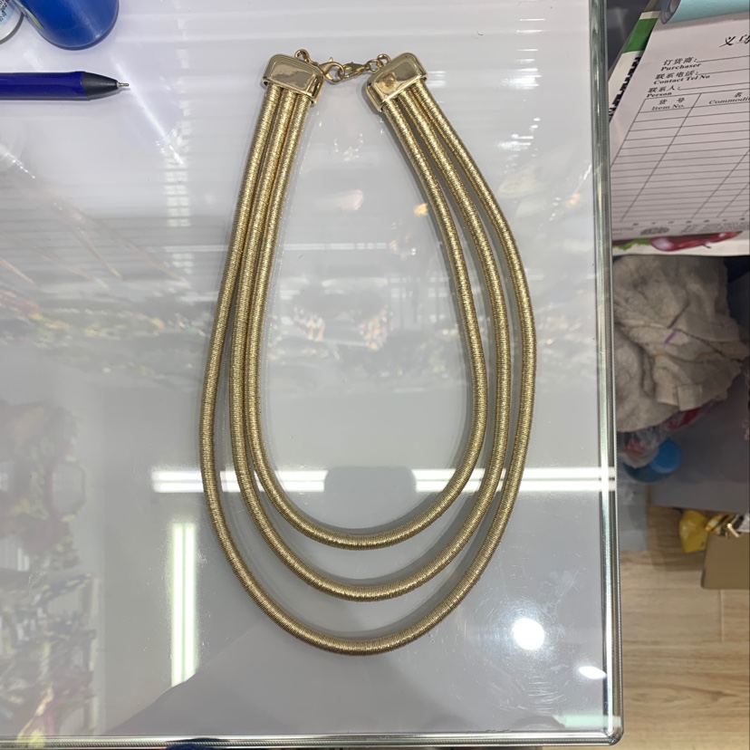 The necklace has three layers