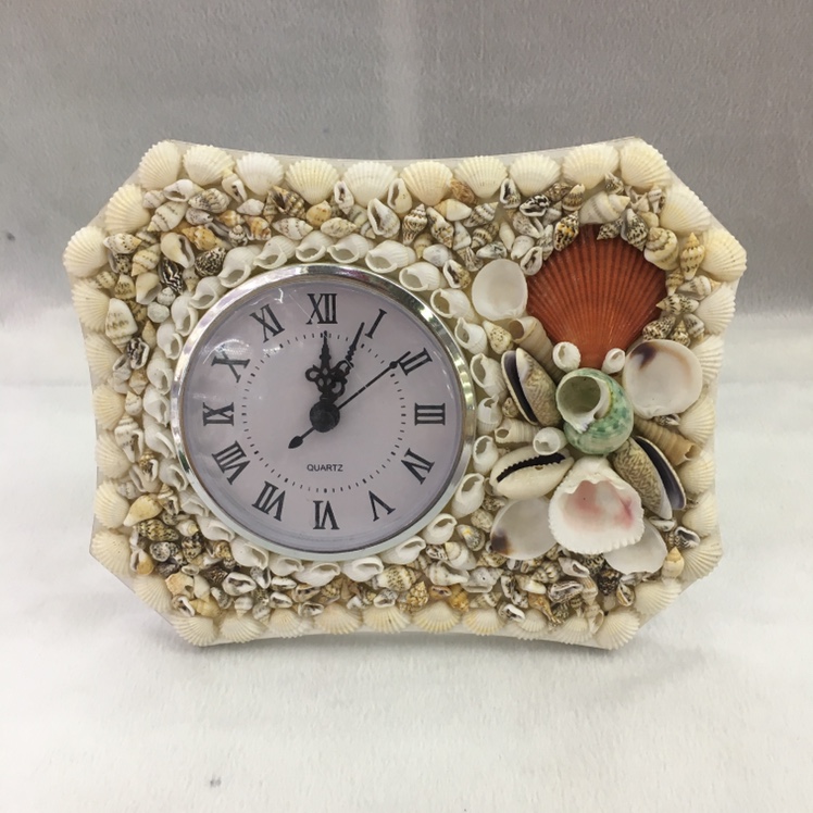 Natural shell clock with beach tourist souvenir
