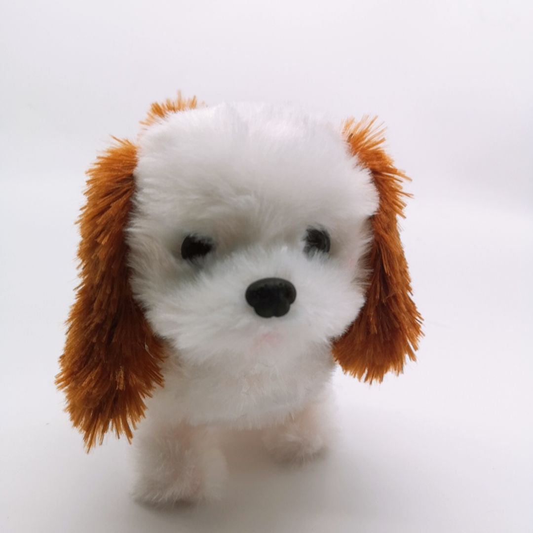 An electric stuffed animal modeled after a bicep bear can bark and walk thumbnail