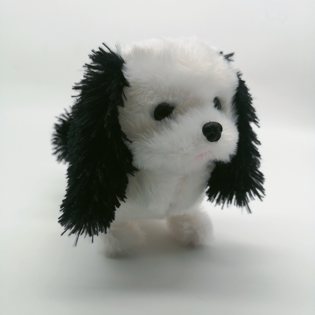 The electric plush toy imitating a Bichon Frise puppy can bark and walk detail image 2