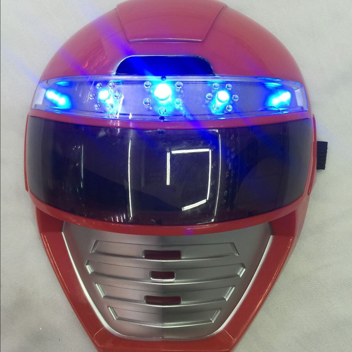 A mask with a lamp and a loud noise