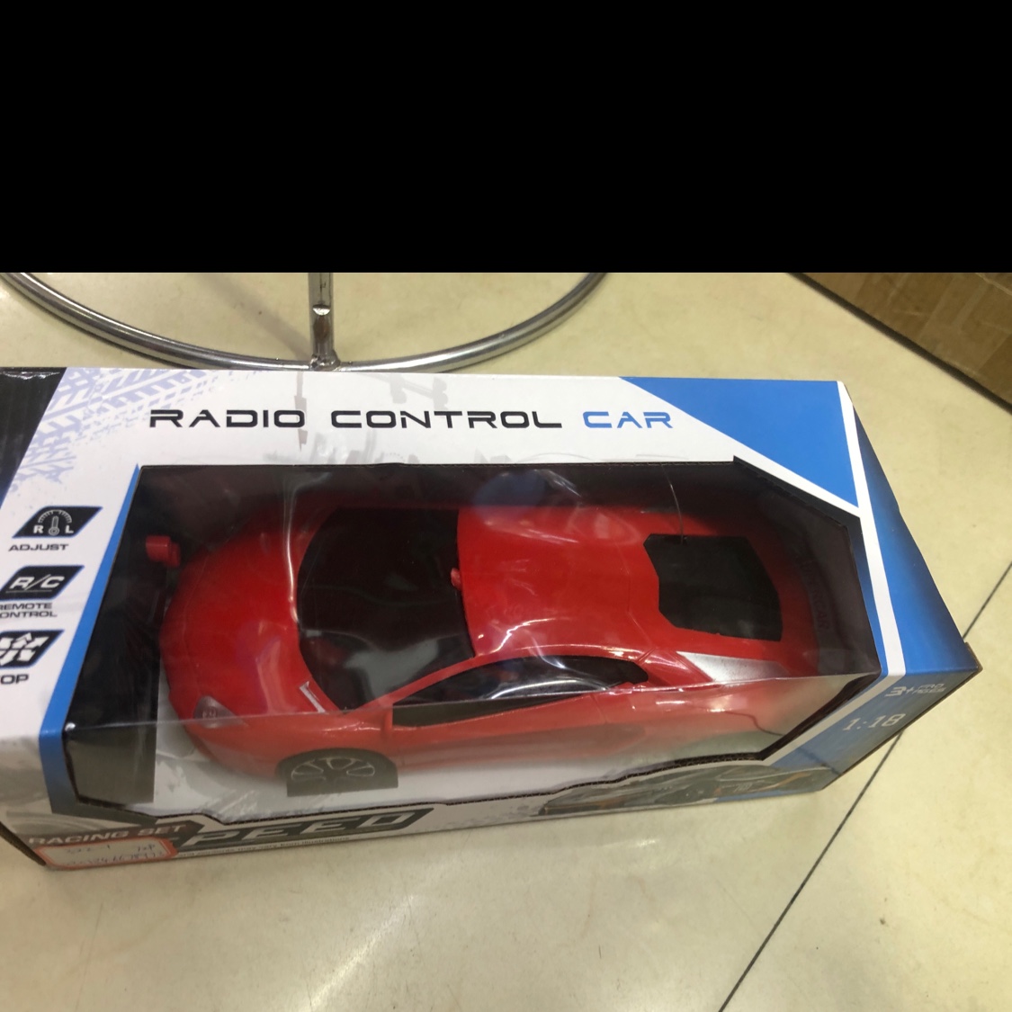 Toy red remote control sports car