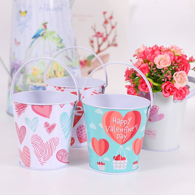A small tin bucket with a heart in a heart on Valentine's Day thumbnail