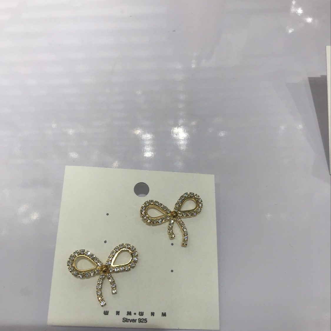 Bow earrings details Picture