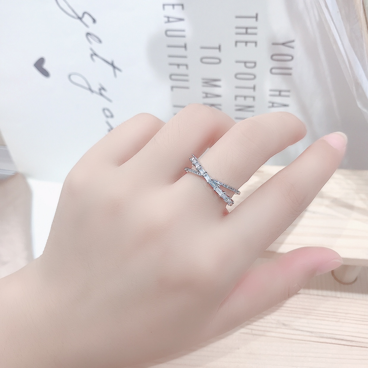 The trendy cross-shaped ring with a unique design for women, featuring an open index finger ring from Xinmingyang details Picture