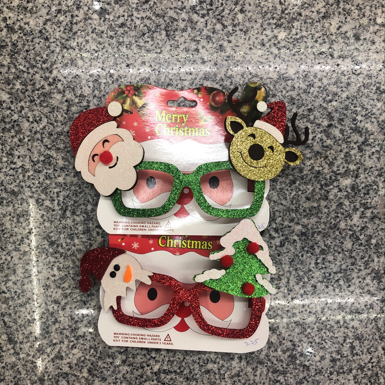 Christmas glasses, bright pink Santa Claus and deer, snowman and Christmas tree