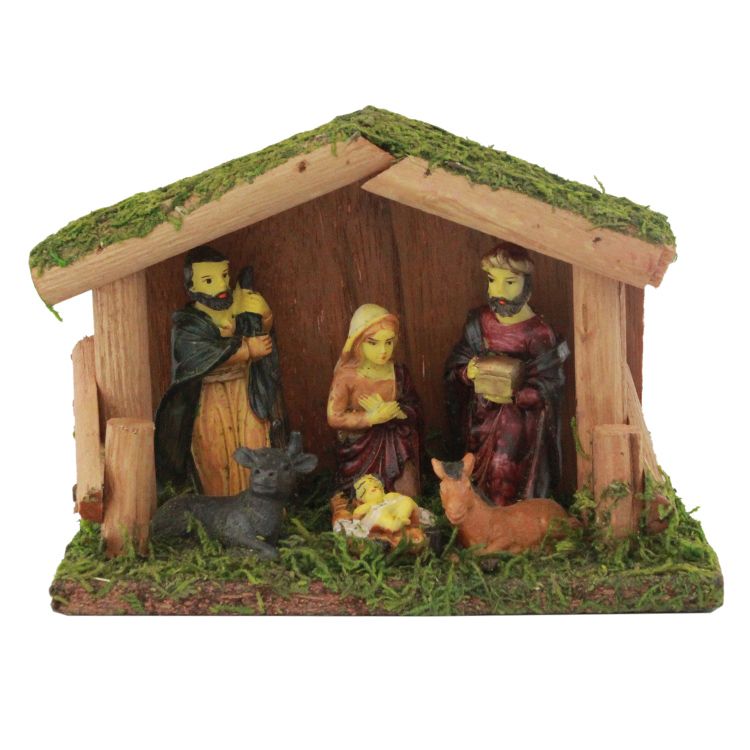 Christmas decorating gift Set in a wooden cabin and manger