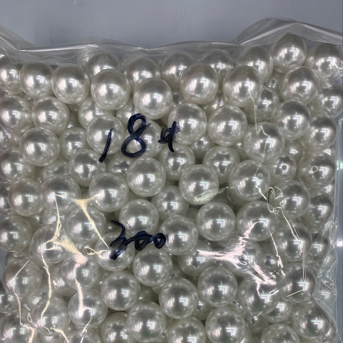 18 half-hole white pearls
