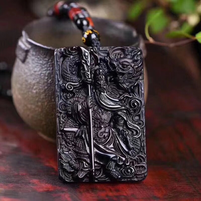 【品名】天然黑曜石降龙关公大刀关羽吊坠
【规格】60*40*12mm图