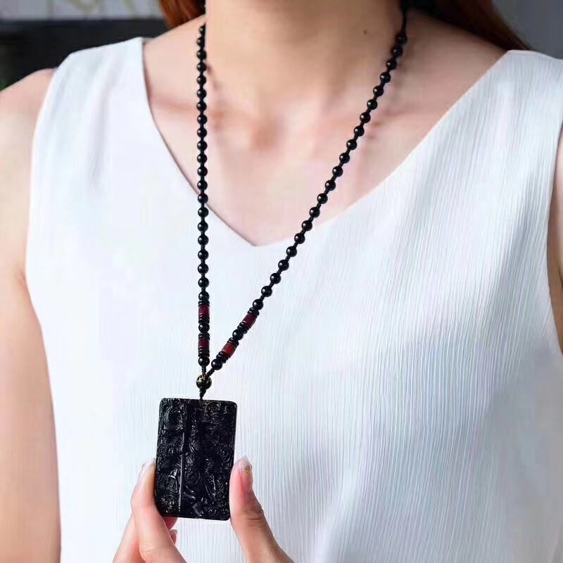 【品名】天然黑曜石降龙关公大刀关羽吊坠
【规格】60*40*12mm详情图6