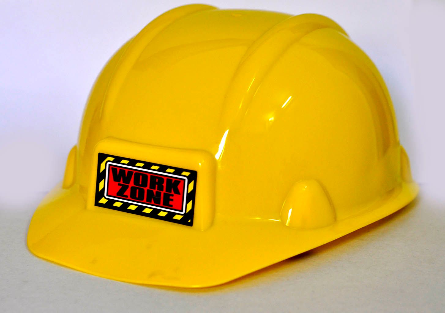 Adult-sized yellow engineer plastic cap